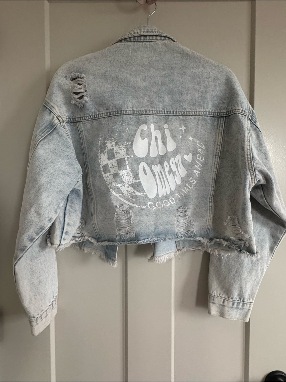 Chi Omega Distressed Light Wash Cropped Denim Jacket